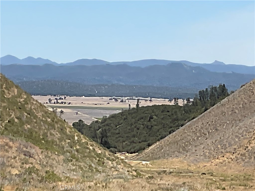 0 Martinez Road King City, CA 93930 - Photo 12 of 52 a view of a lake with mountains in the background