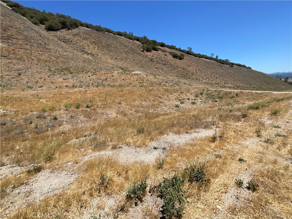 0 Martinez Road King City, CA 93930 - Photo 14 of 52 a view of a dry yard with mountains in the background