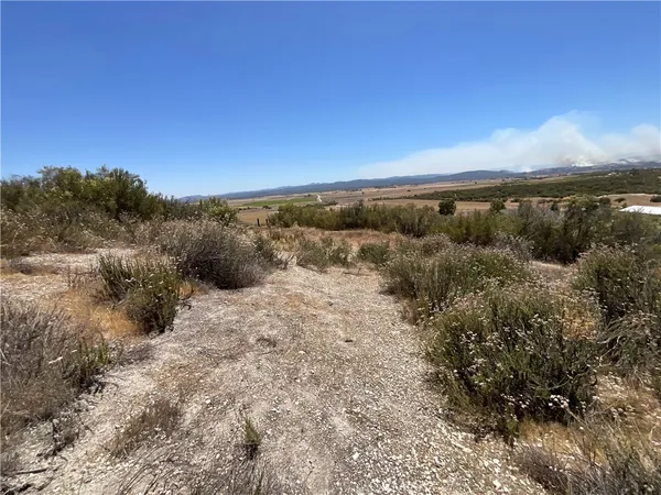 a view of a beach with an ocean view