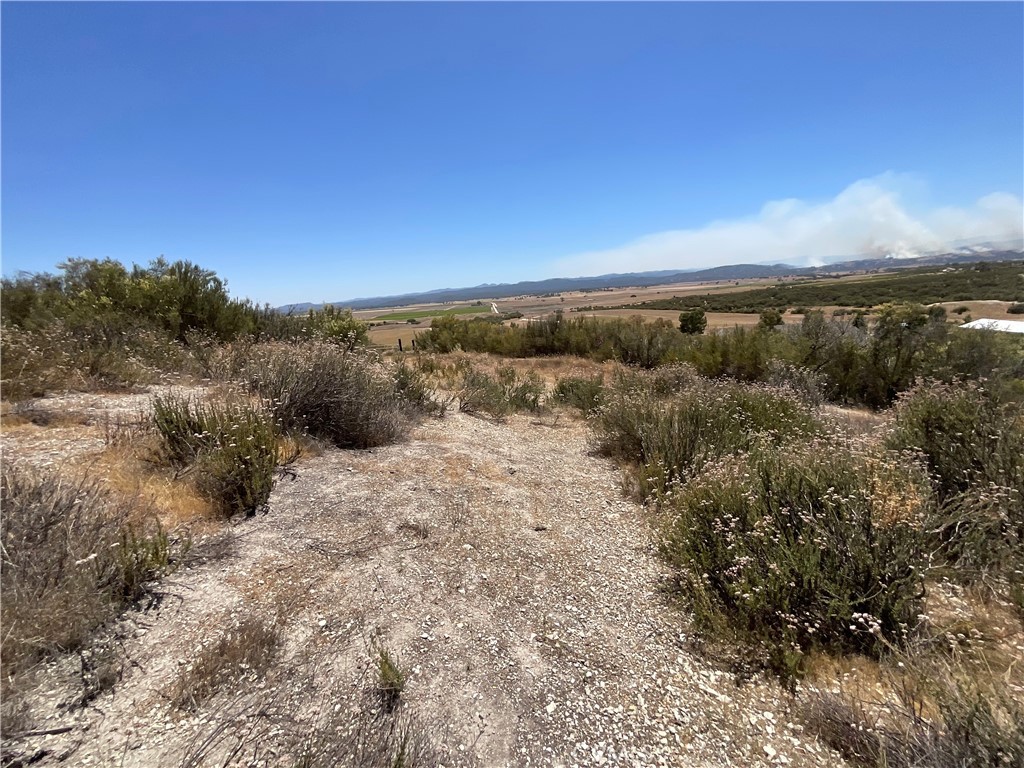 0 Martinez Road King City, CA 93930 - Photo 30 of 52 a view of a lake with mountains in the background