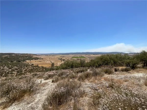 a view of mountain view with mountains in the background