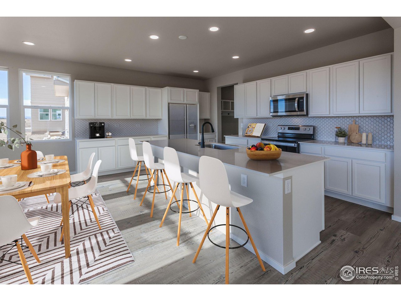 6634 4th St Road Greeley, CO 80634 - Photo 3 of 39 KITCHEN W/ ISLAND