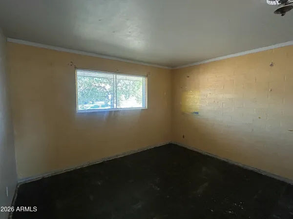 an empty room with a window