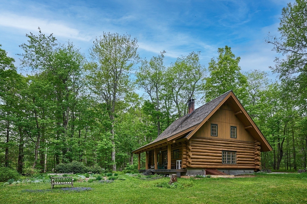 486 Old Stage Road Ashfield, MA 01330 - Photo 30 of 36 a house view with a garden space