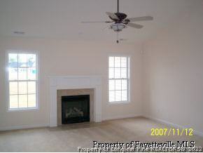 6613 Valley Falls Road Hope Mills, NC 28348 - Photo 2 of 7 a view of an empty room with a window