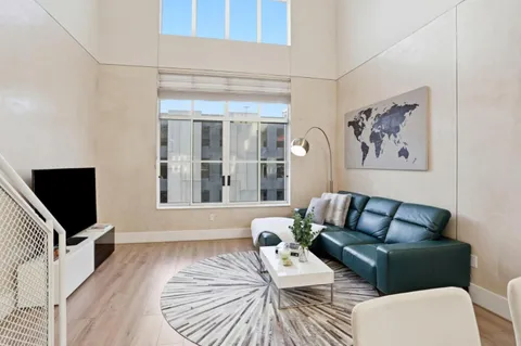 a kitchen with appliances cabinets and a counter top space