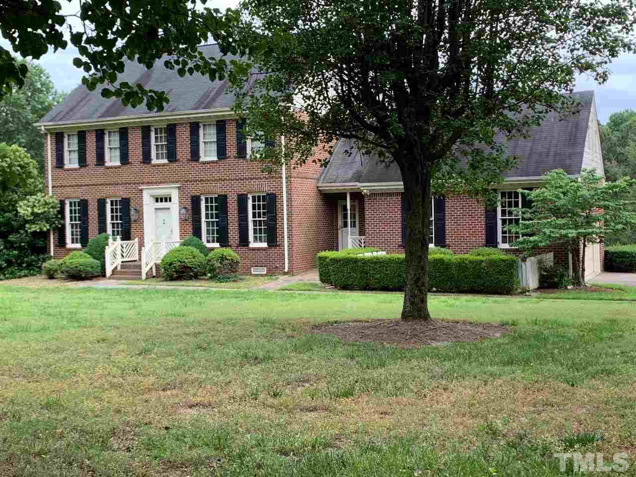 a house view with a garden space