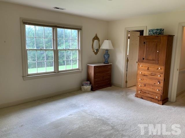 717 Brookfield Road Raleigh, NC 27615 - Photo 20 of 30 an empty room with closet and windows