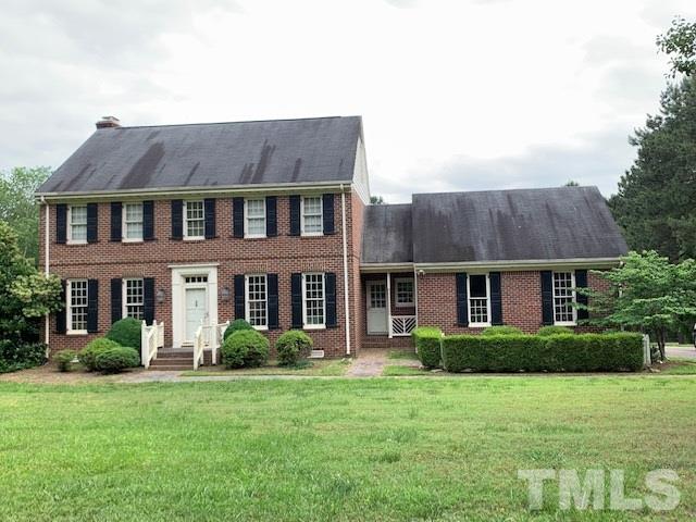 717 Brookfield Road Raleigh, NC 27615 - Photo 30 of 30 a front view of a house with garden