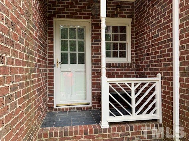 717 Brookfield Road Raleigh, NC 27615 - Photo 4 of 30 a front view of a house with a window