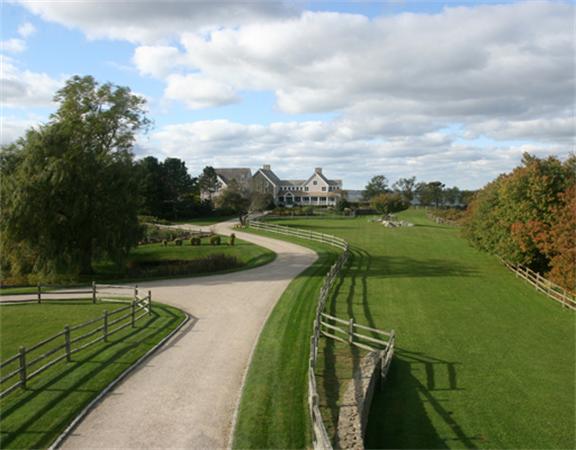 88 Mill Lane Yarmouth, MA 02675 - Photo 2 of 13 a view of a lake with a yard