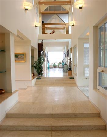 88 Mill Lane Yarmouth, MA 02675 - Photo 6 of 13 a view of a hallway with a living room