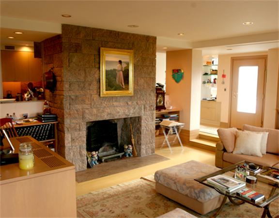 88 Mill Lane Yarmouth, MA 02675 - Photo 8 of 13 a living room with furniture and a fireplace