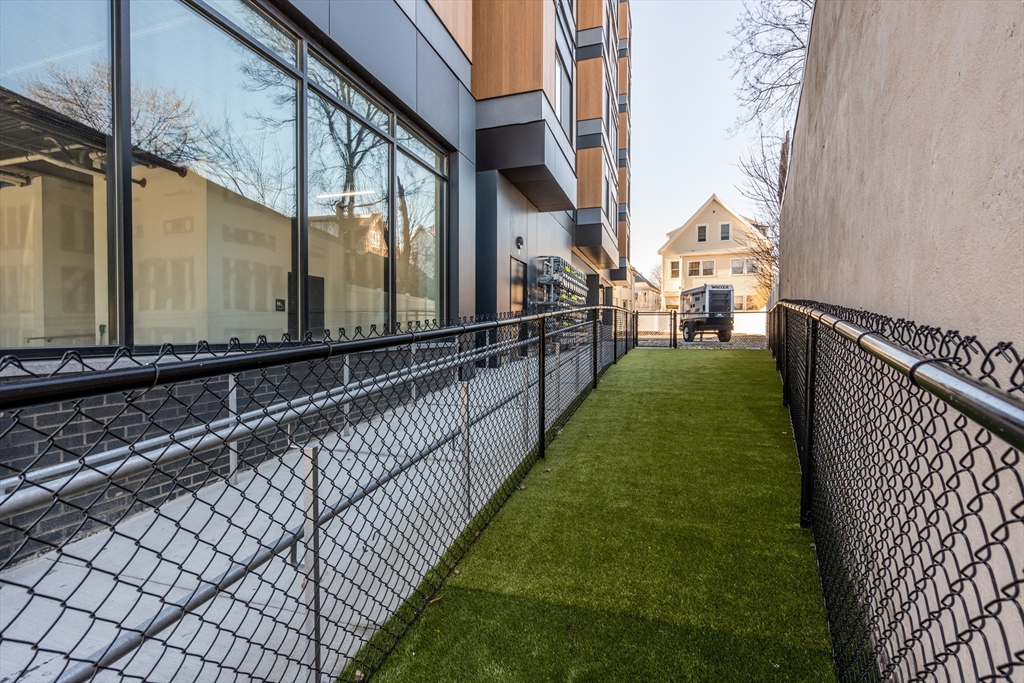 600 Broadway, Unit 612 Chelsea, MA 02150 - Photo 27 of 30 a view of a pathway of a building from a window