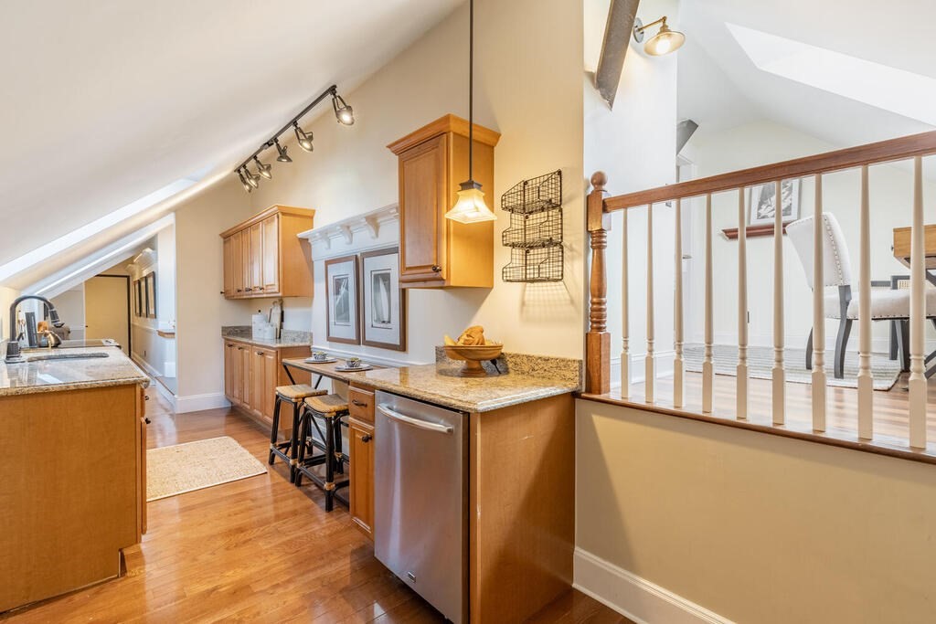 8 Summer Street, Unit 415 Gloucester, MA 01930 - Photo 12 of 32 a view of a kitchen with furniture and a window