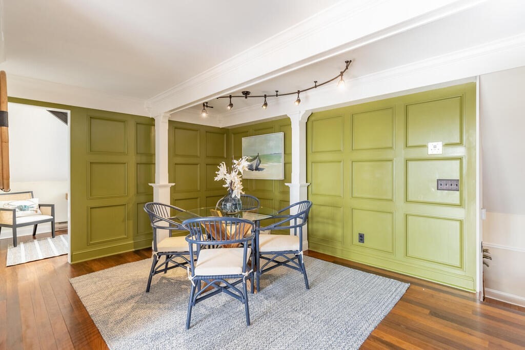 8 Summer Street, Unit 415 Gloucester, MA 01930 - Photo 15 of 32 a dining room with furniture and wooden floor