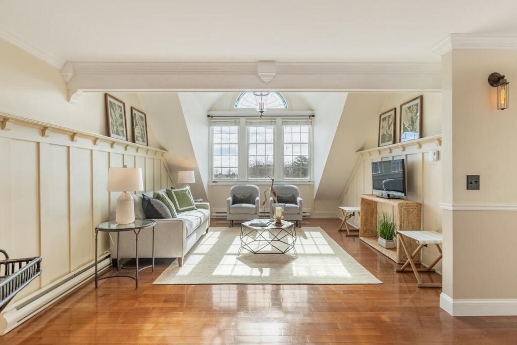 8 Summer Street, Unit 415 Gloucester, MA 01930 - Photo 16 of 32 a living room with furniture