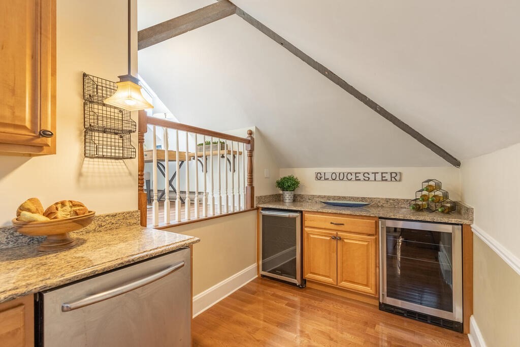 8 Summer Street, Unit 415 Gloucester, MA 01930 - Photo 10 of 32 a kitchen with a stove and a sink
