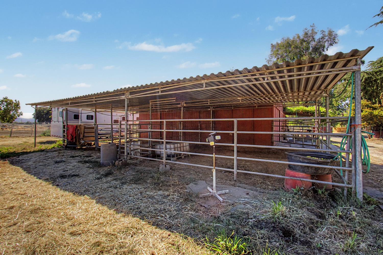 1180 Sunset Road Brentwood, CA 94513 - Photo 17 of 72 Front open stalls on the barn