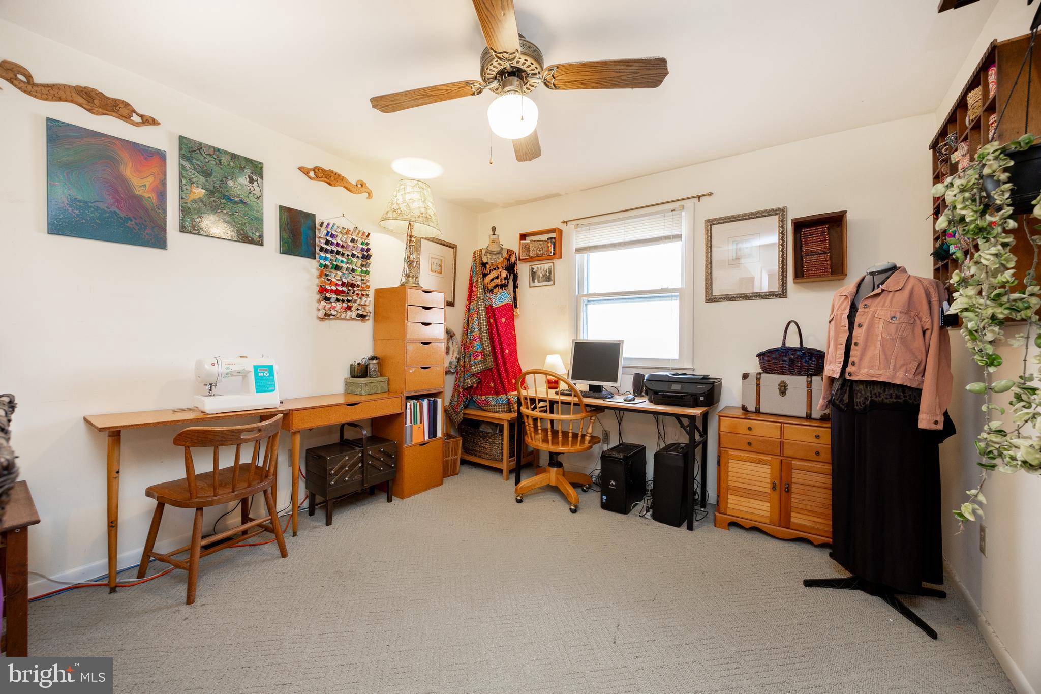 4455 Bethel Road Upper Chichester, PA 19061 - Photo 15 of 27 a view of a workspace with furniture and a window