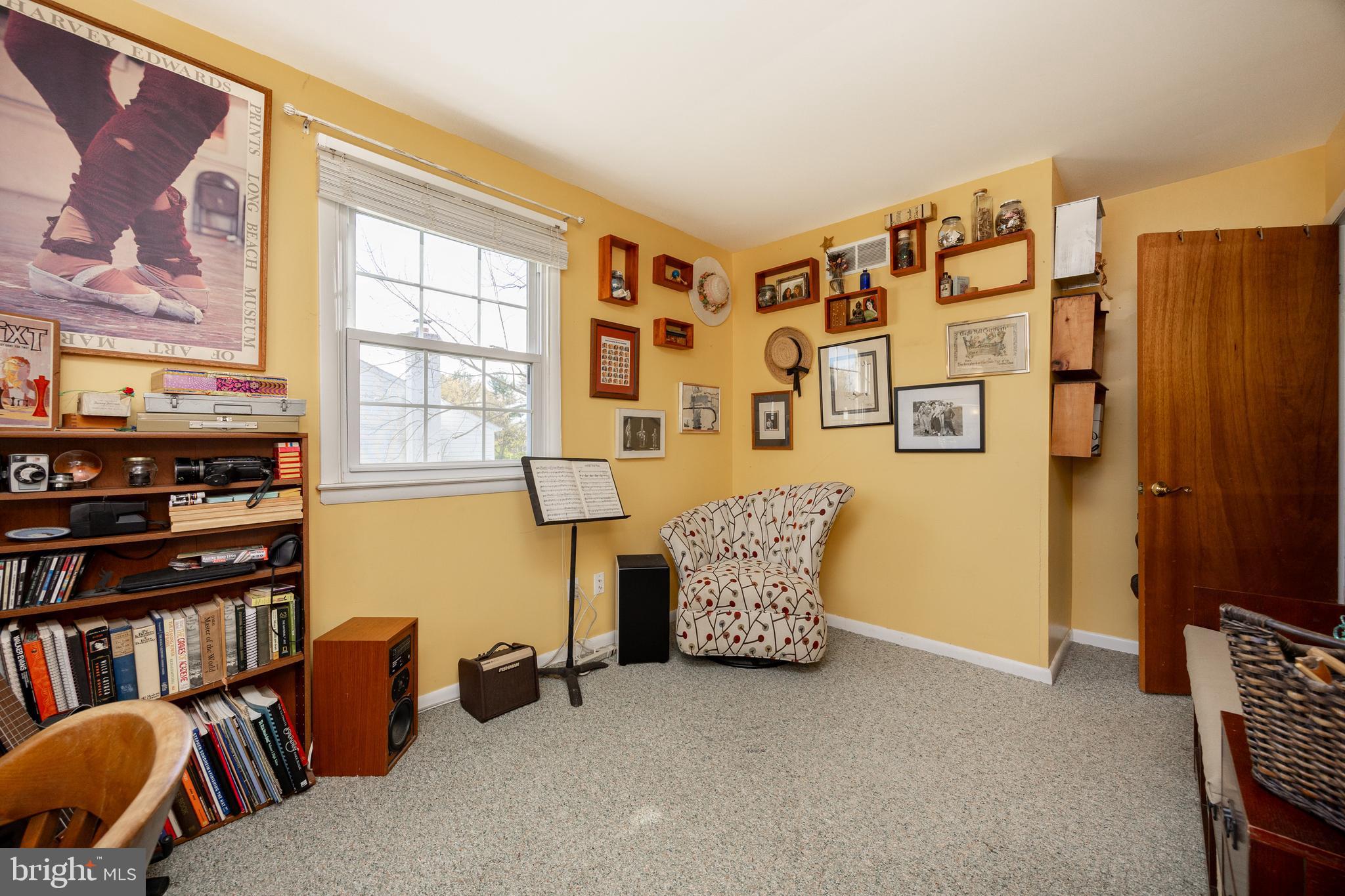 4455 Bethel Road Upper Chichester, PA 19061 - Photo 18 of 27 a living room with furniture and a flat screen tv