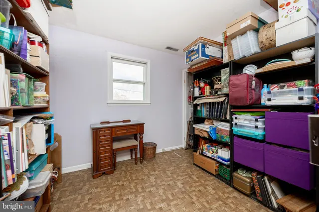 a room with furniture and a flat screen tv