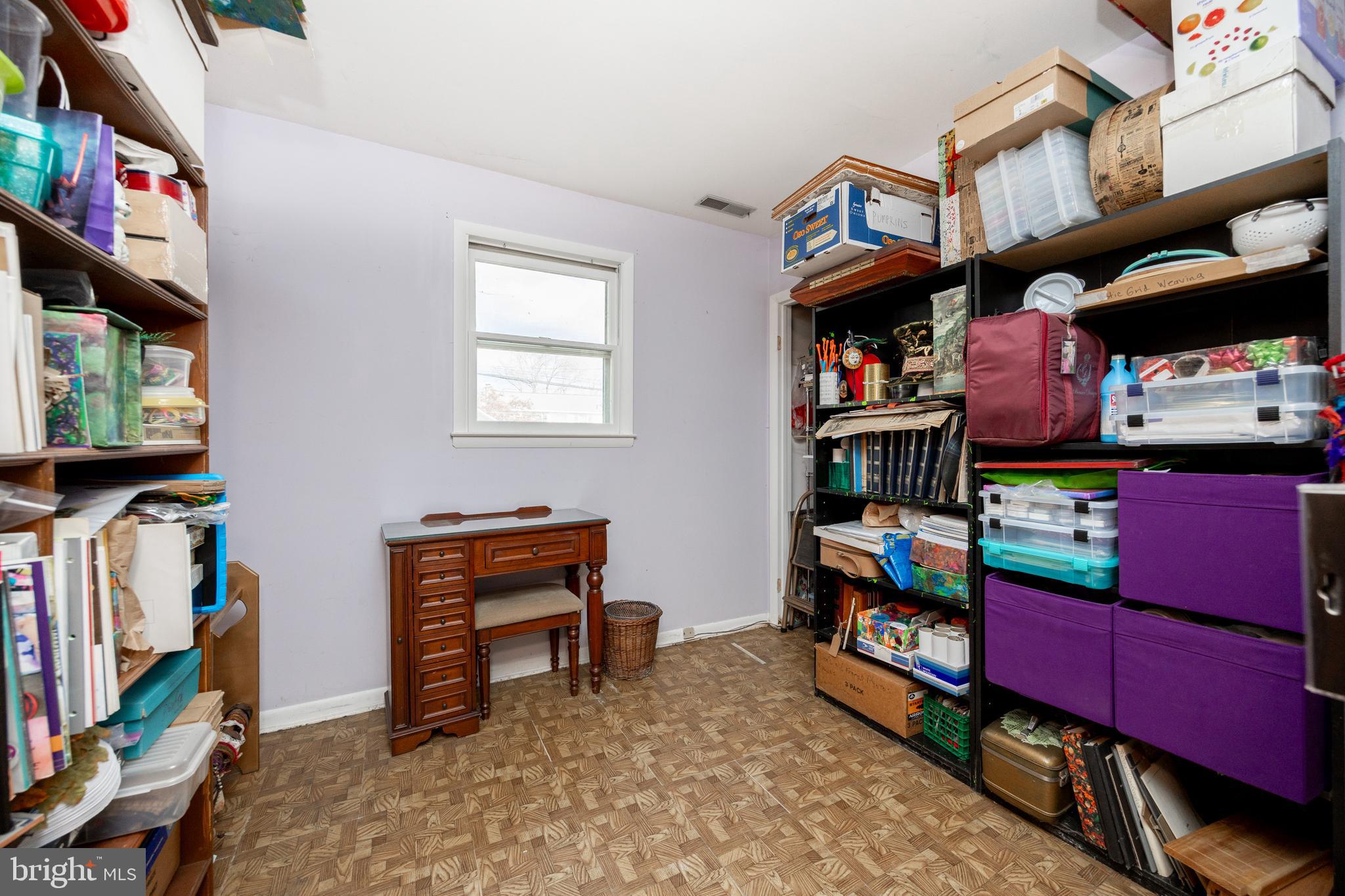 4455 Bethel Road Upper Chichester, PA 19061 - Photo 22 of 27 a room with furniture and a flat screen tv