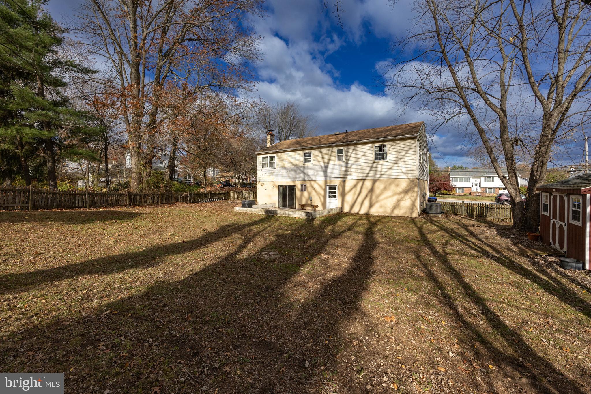 4455 Bethel Road Upper Chichester, PA 19061 - Photo 26 of 27 a view of a yard with wooden fence