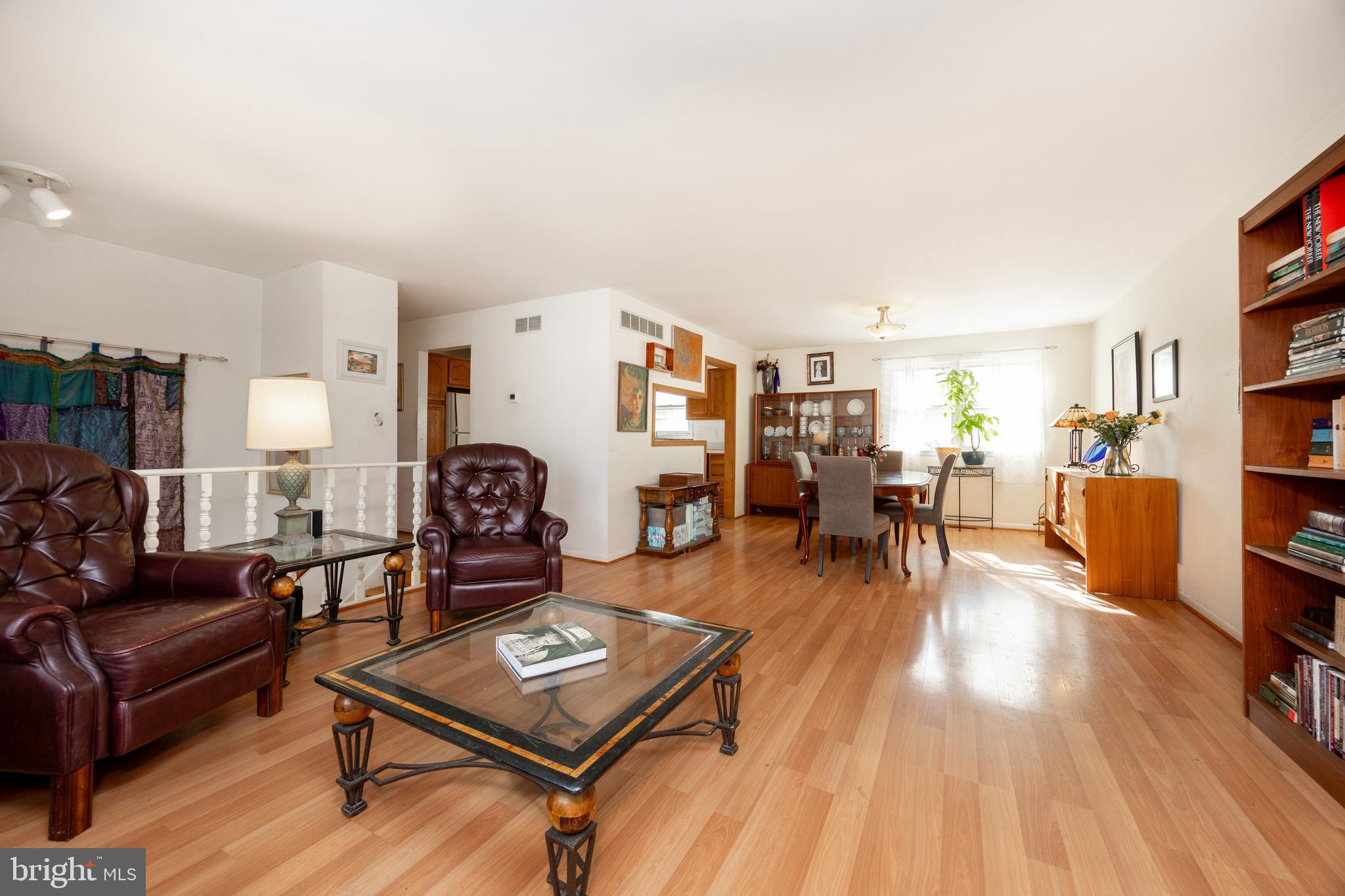 4455 Bethel Road Upper Chichester, PA 19061 - Photo 7 of 27 a living room with furniture and a wooden floor