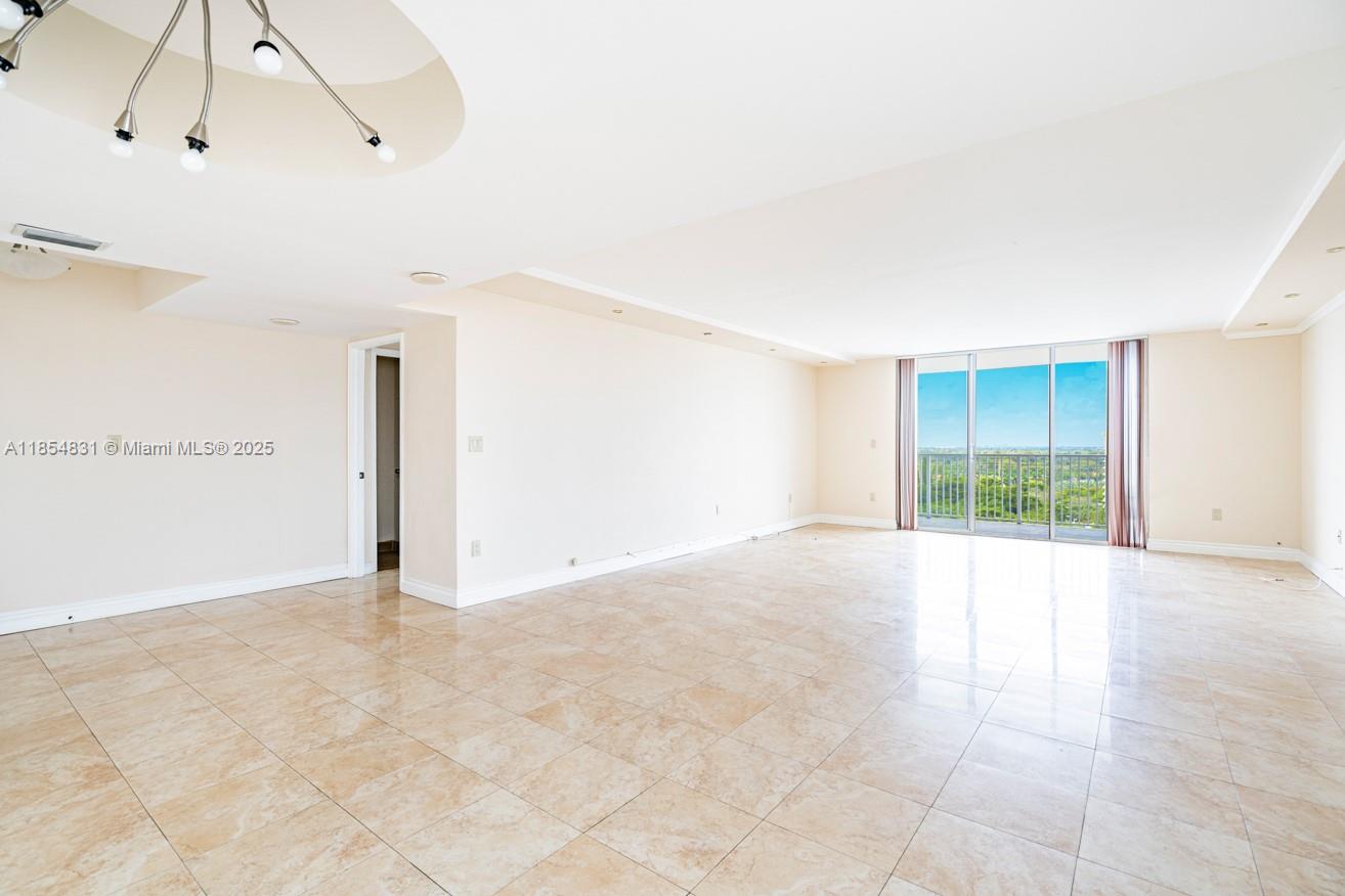 2801 Northeast 183rd Street, Unit 1401W Aventura, FL 33160 - Photo 7 of 26 a view of an empty room with a window