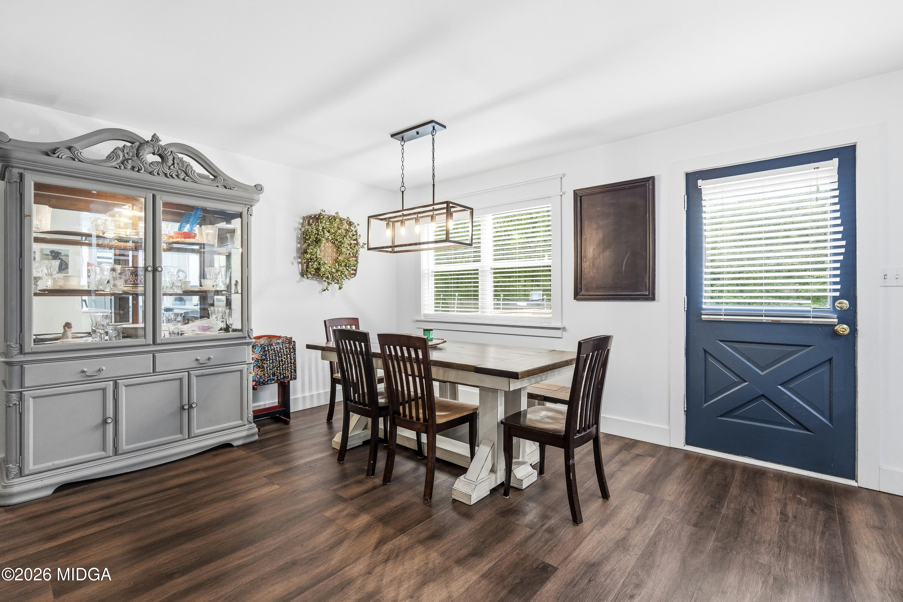 174 Sandra Drive Gray, GA 31032 - Photo 11 of 41 a view of a dining room with furniture window and wooden floor