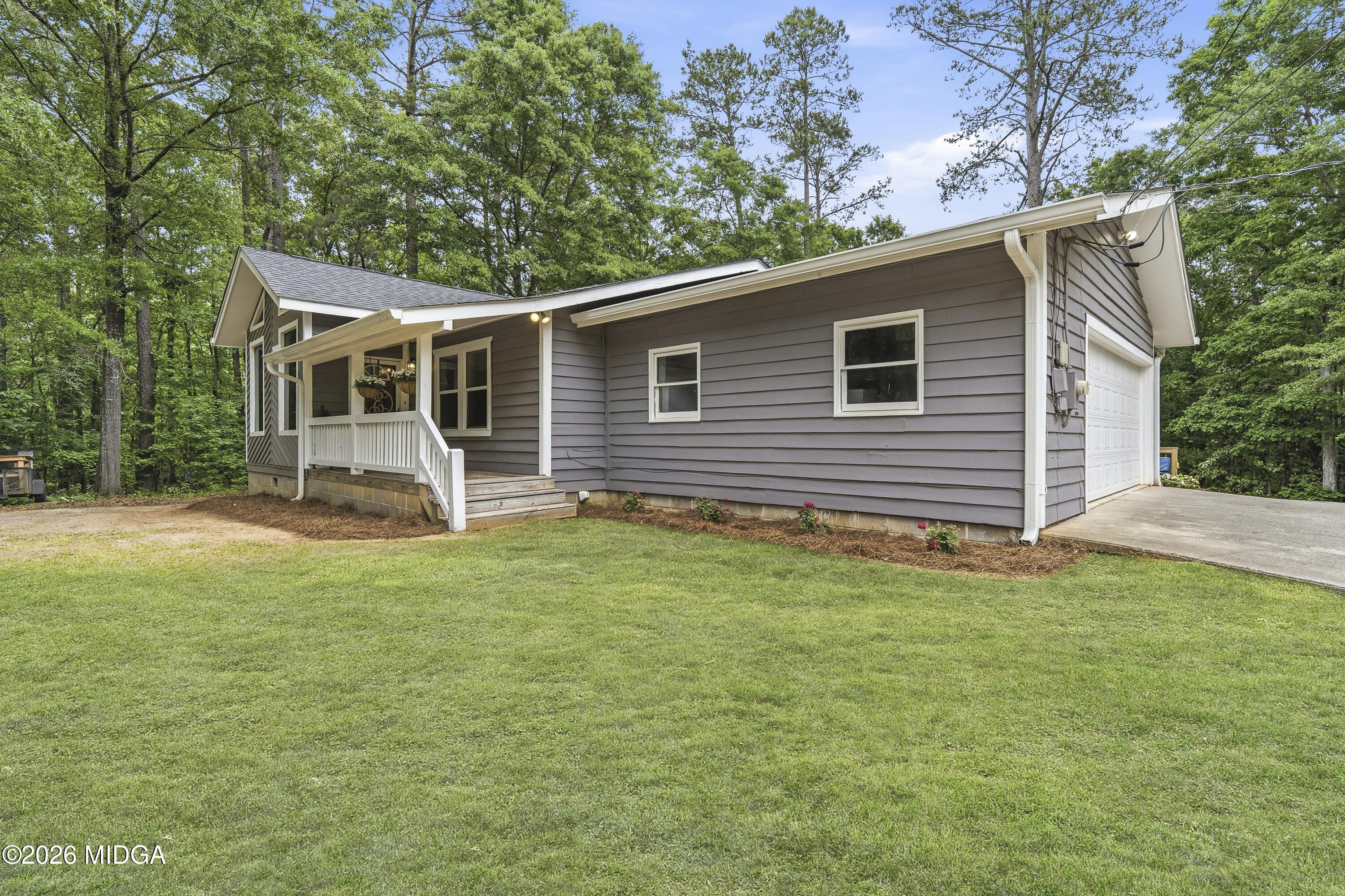 174 Sandra Drive Gray, GA 31032 - Photo 2 of 41 a view of a house with a backyard