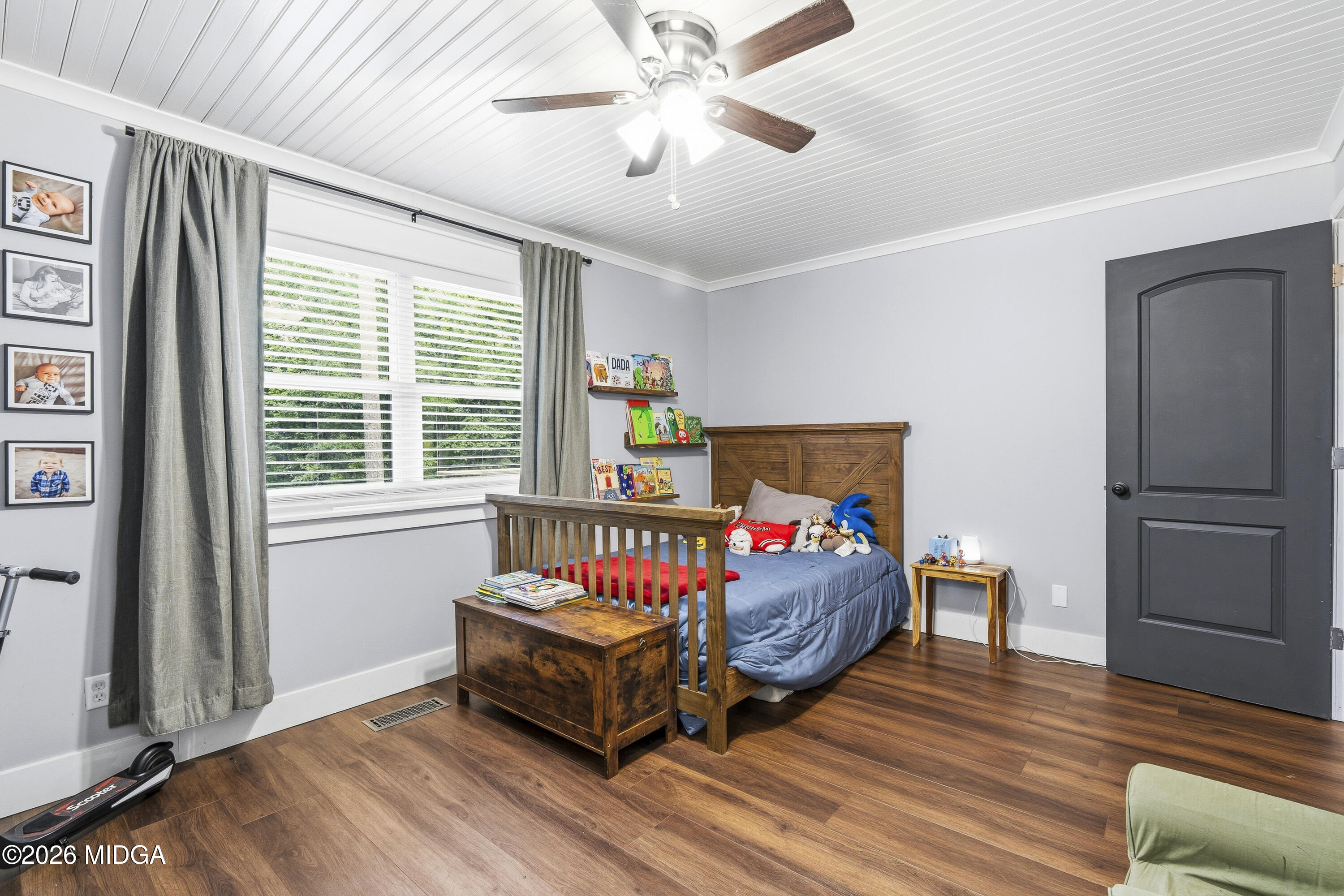 174 Sandra Drive Gray, GA 31032 - Photo 29 of 41 a bedroom with a bed and a window