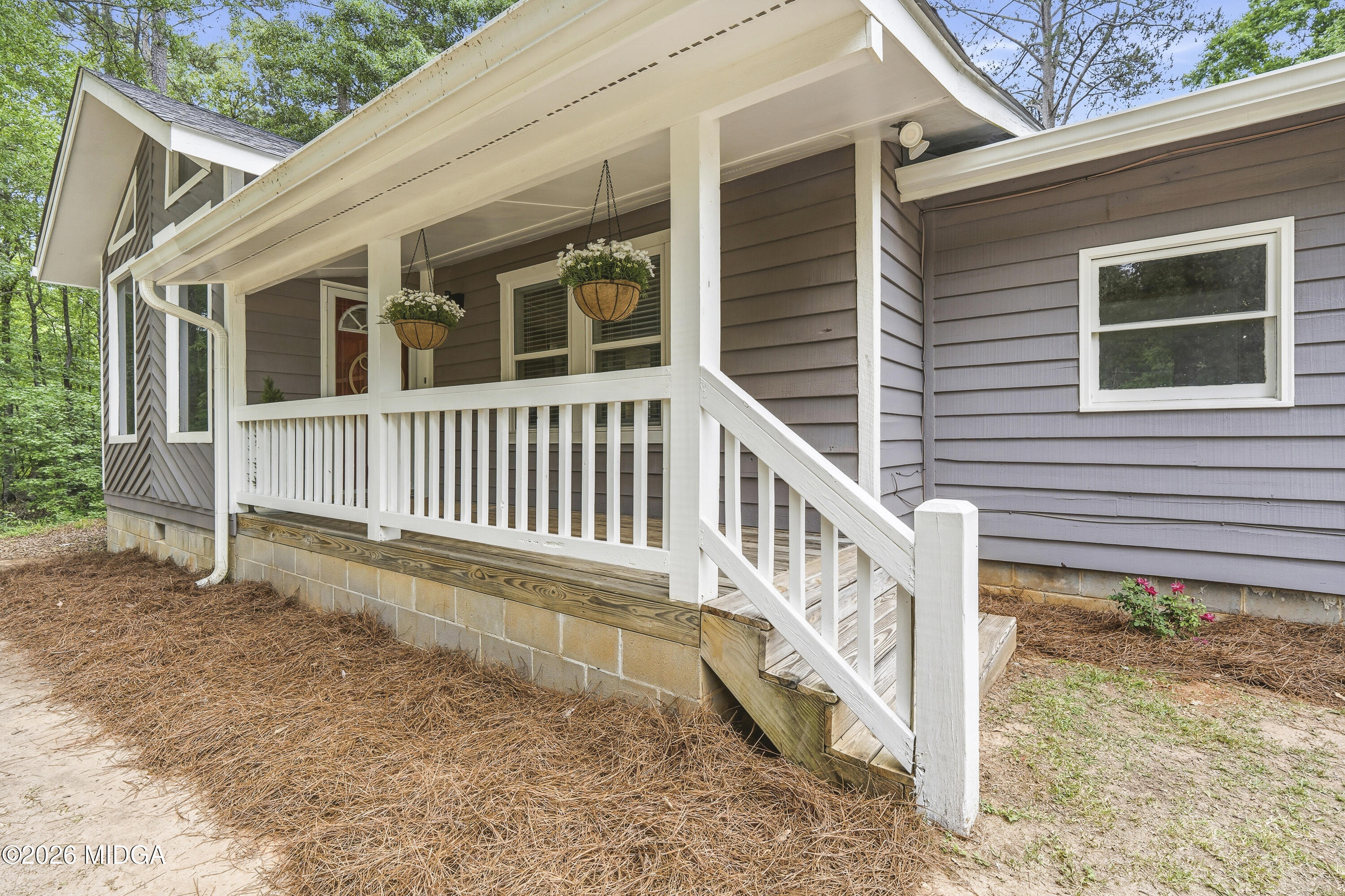 174 Sandra Drive Gray, GA 31032 - Photo 3 of 41 a view of a house with wooden fence