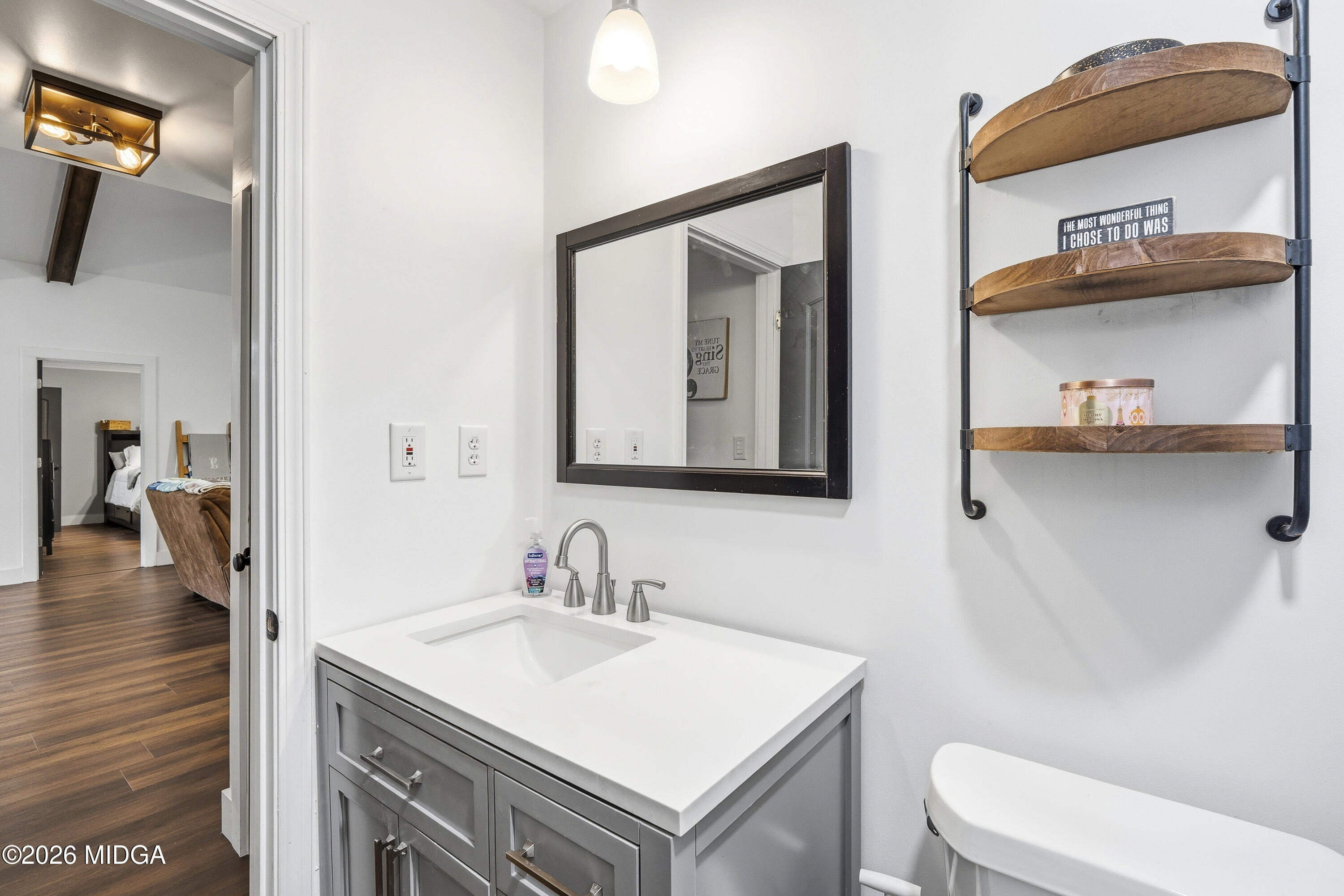 174 Sandra Drive Gray, GA 31032 - Photo 32 of 41 a bathroom with a sink toilet and mirror