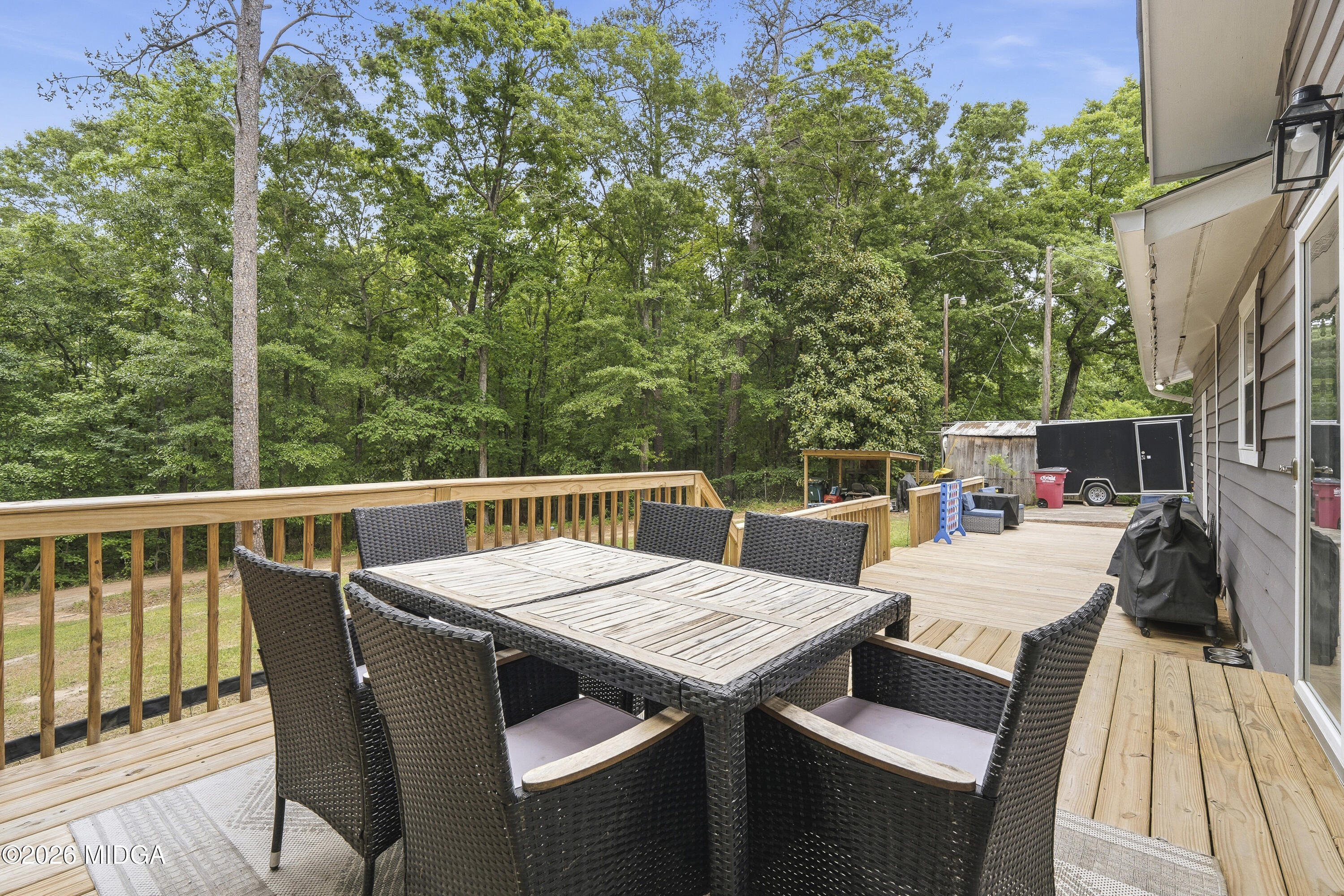 174 Sandra Drive Gray, GA 31032 - Photo 33 of 41 a balcony with wooden floor table and chairs