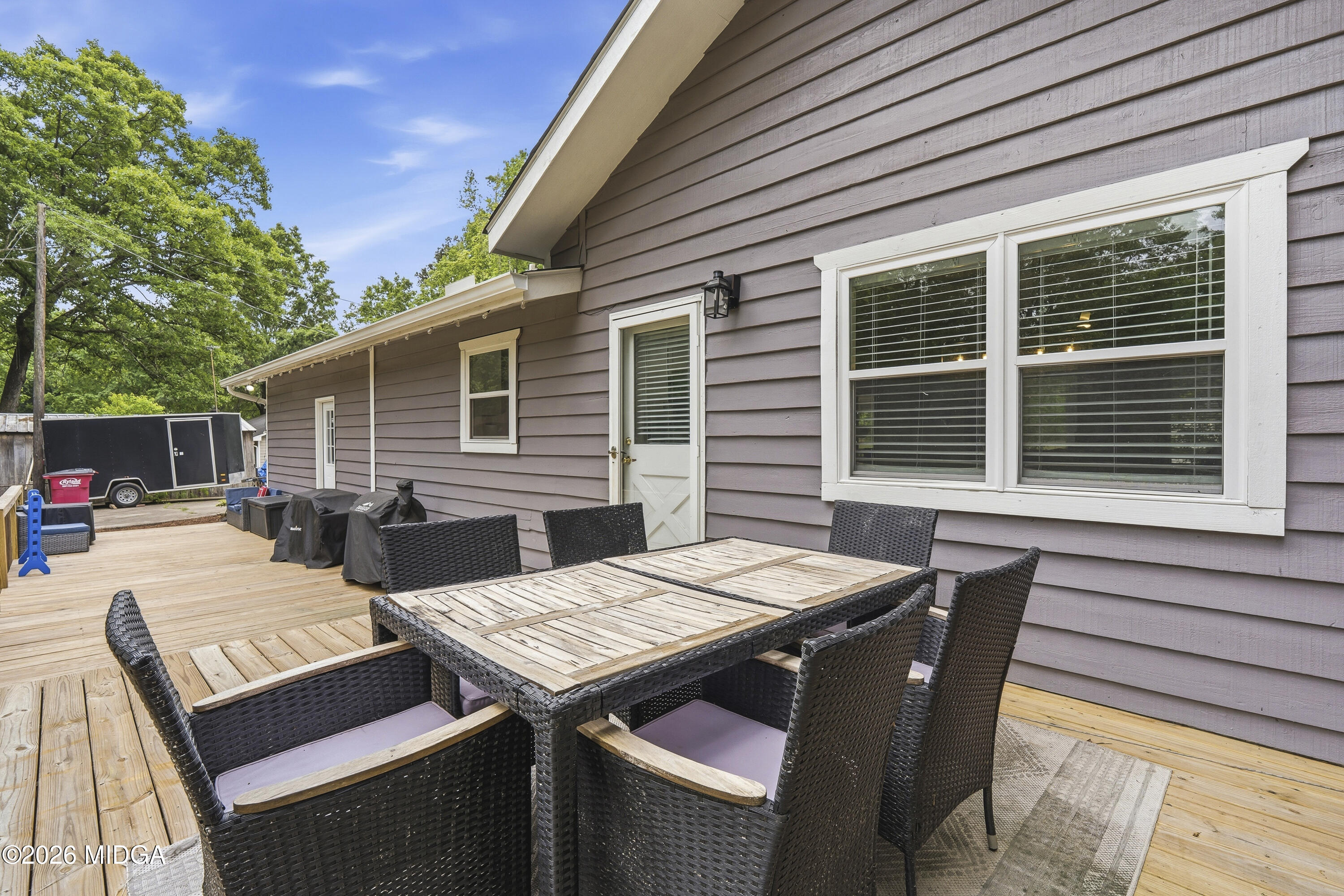 174 Sandra Drive Gray, GA 31032 - Photo 34 of 41 a view of a dinning table and chairs in the back yard