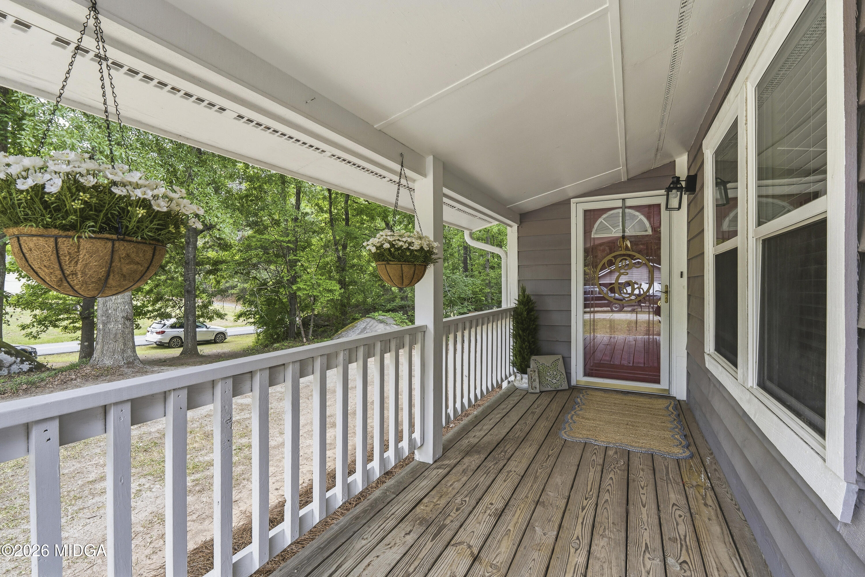 174 Sandra Drive Gray, GA 31032 - Photo 4 of 41 a view of a balcony with wooden floor
