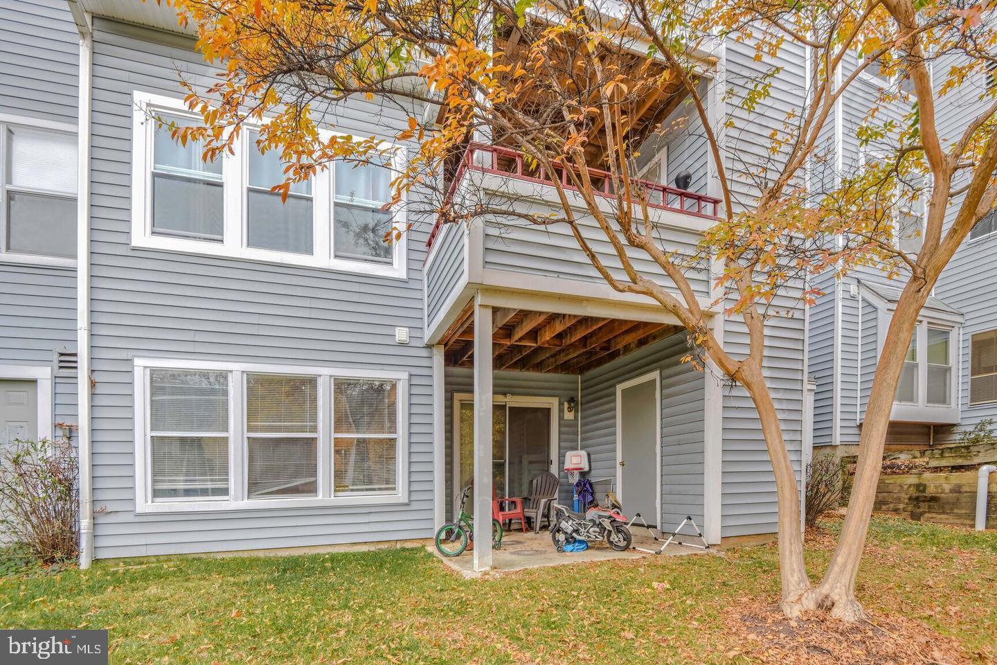 13701 Modrad Way, Unit 9C12 Silver Spring, MD 20904 - Photo 12 of 12 a view of house with a yard