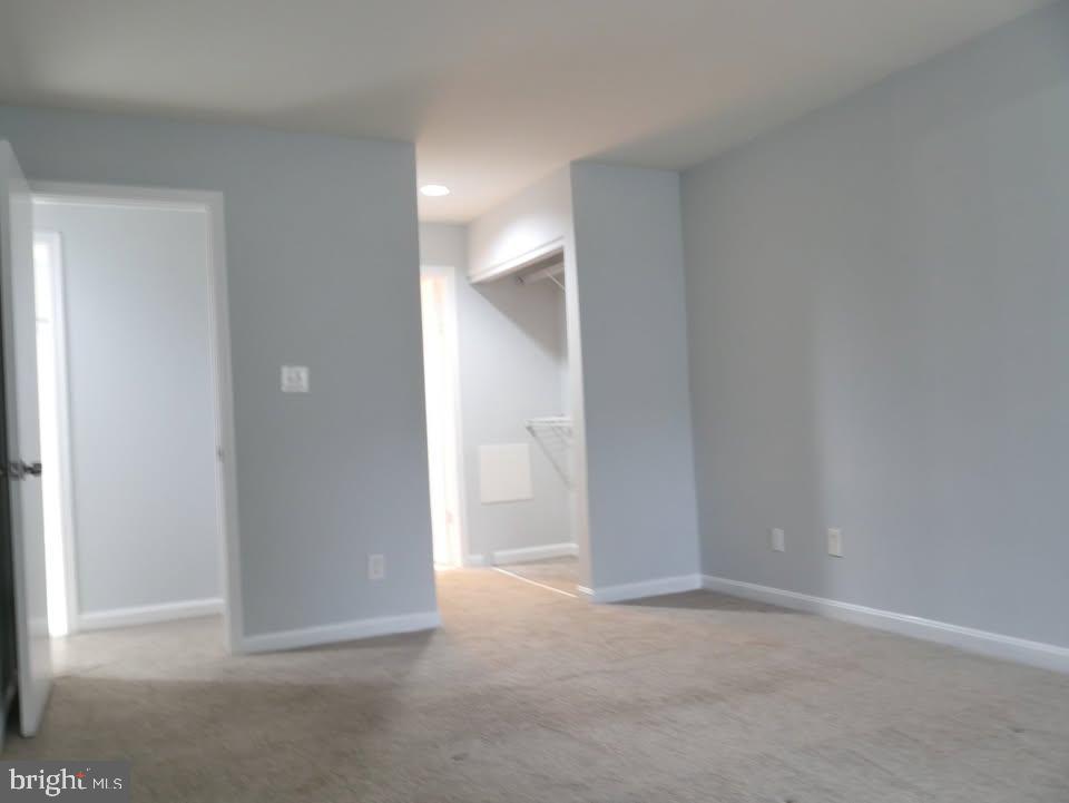 13701 Modrad Way, Unit 9C12 Silver Spring, MD 20904 - Photo 3 of 12 a view of an empty room