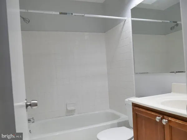 a bathroom with a sink and a bathtub
