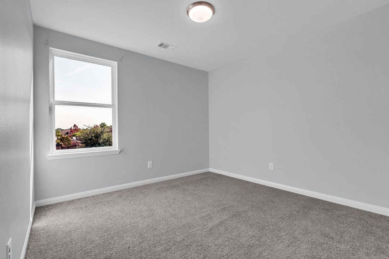 22703 Threefold Ridge Drive Hockley, TX 77447 - Photo 25 of 36 an empty room with a window