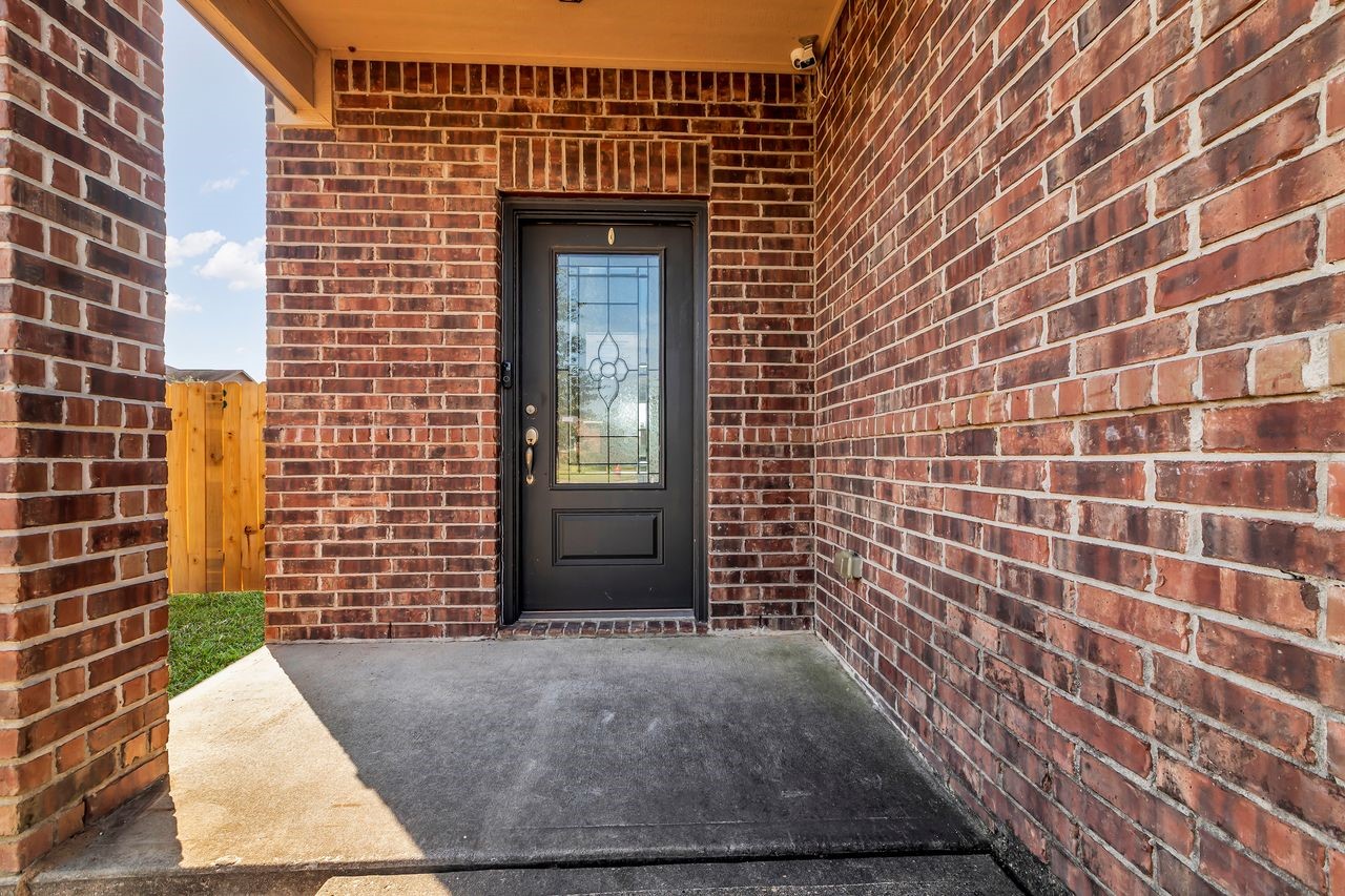 22703 Threefold Ridge Drive Hockley, TX 77447 - Photo 4 of 36 a view of front door of house