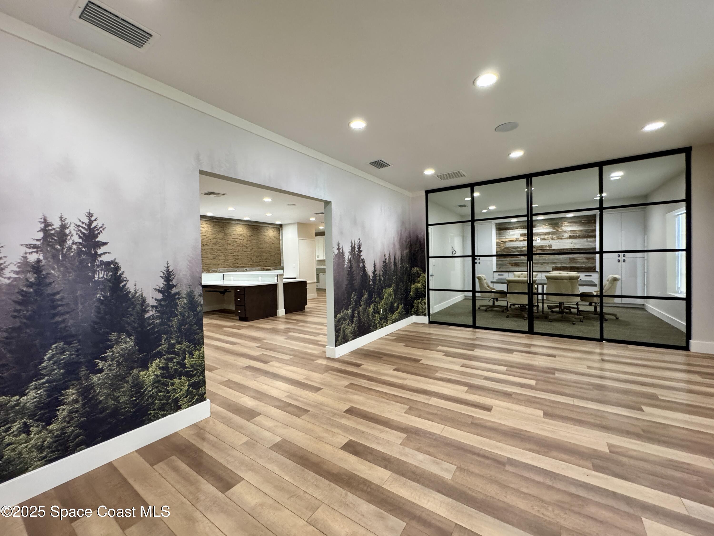 3210 North Wickham Road, Unit 2 Melbourne, FL 32935 - Photo 3 of 14 a view of a living room