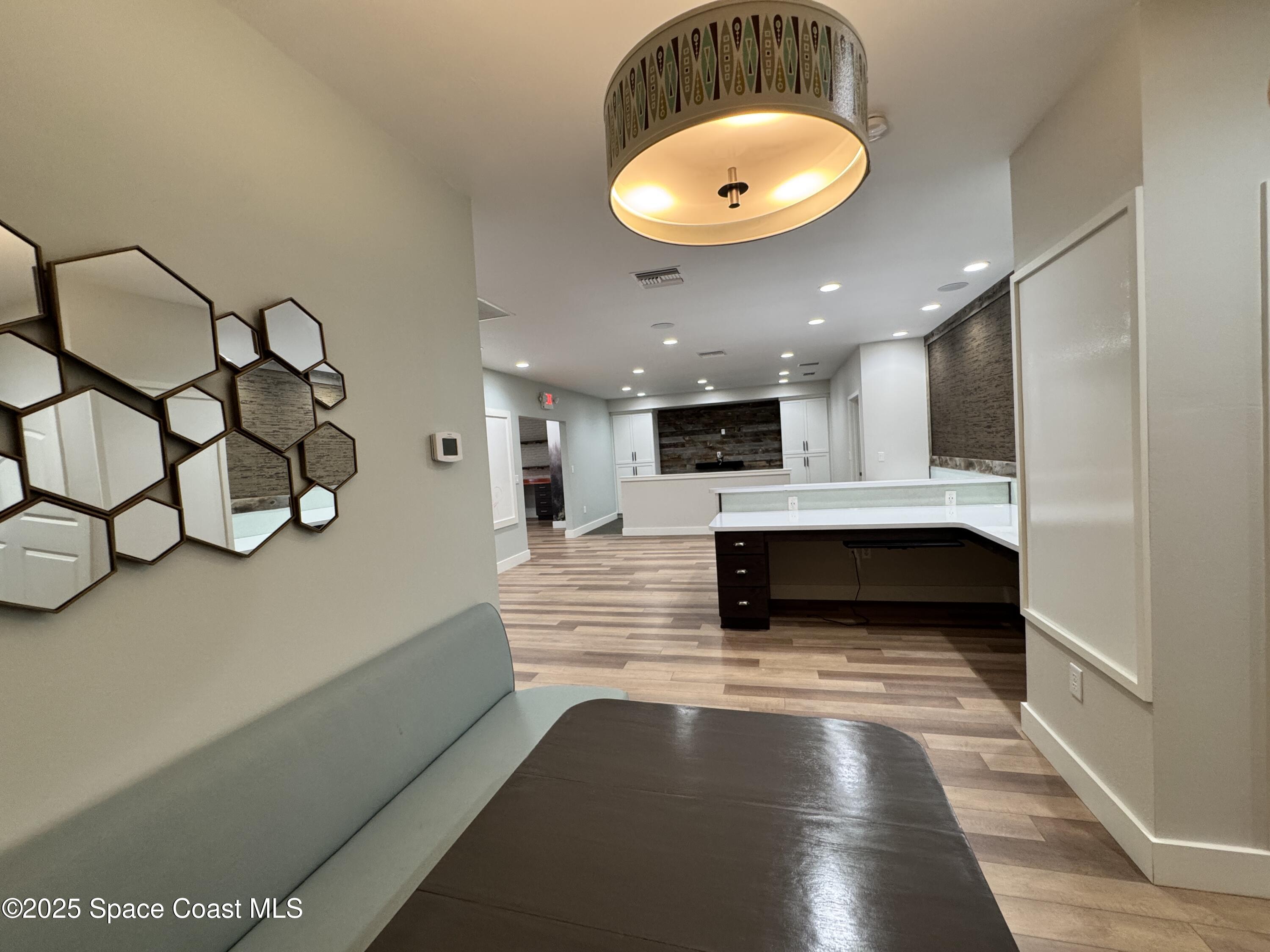 3210 North Wickham Road, Unit 2 Melbourne, FL 32935 - Photo 10 of 14 a view of kitchen with a sink and microwave
