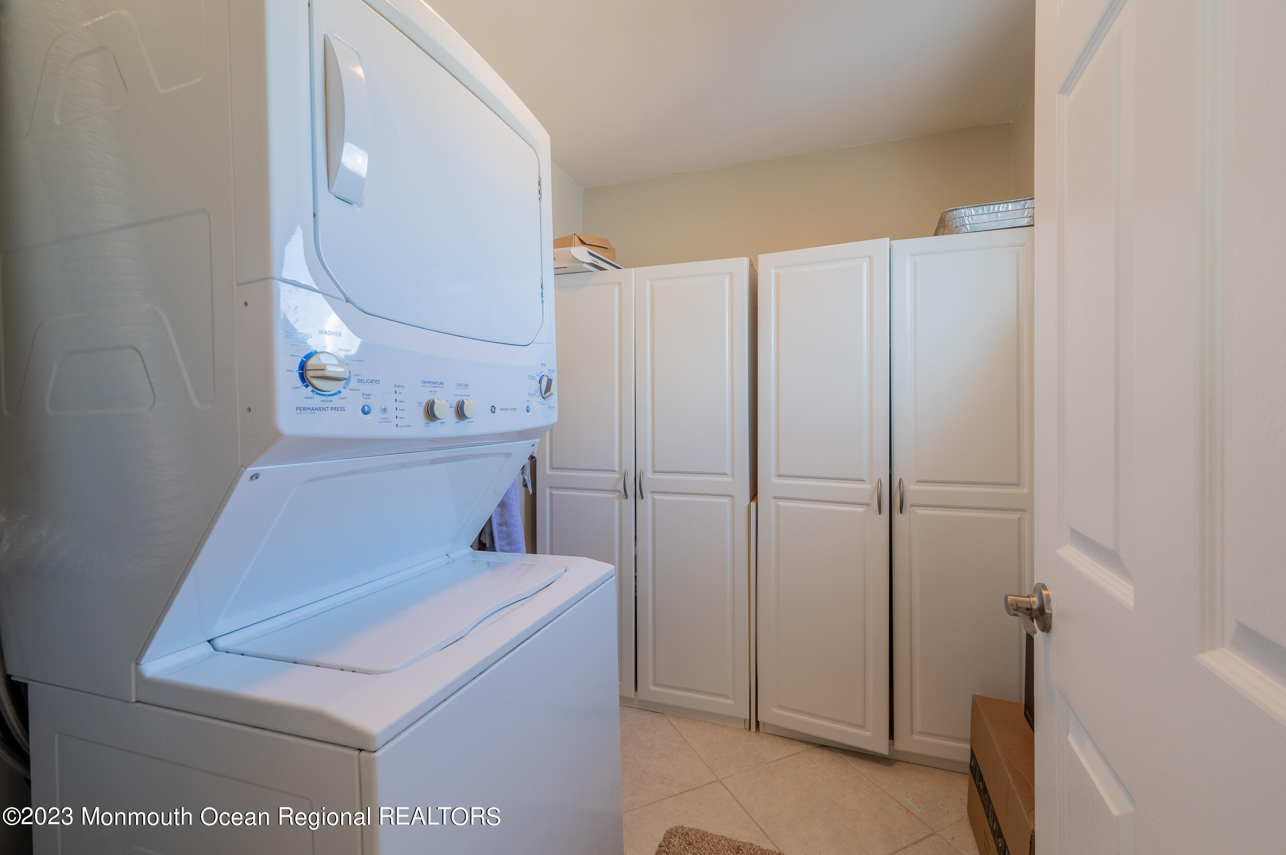 121 Jacobsen Lane Lavallette, NJ 08735 - Photo 9 of 19 a utility room with dryer and washer