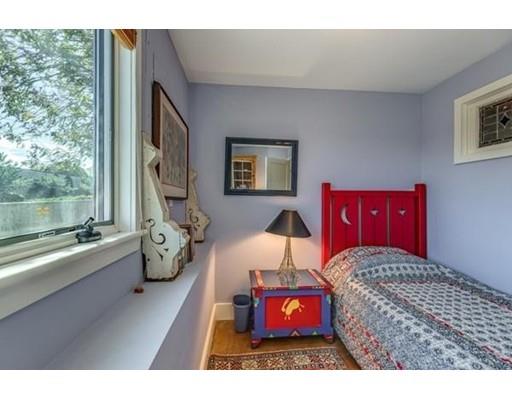 2 Gas House Lane Marblehead, MA 01945 - Photo 17 of 25 a bedroom with furniture and a large window