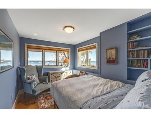 2 Gas House Lane Marblehead, MA 01945 - Photo 18 of 25 a bedroom with a large bed and a large window