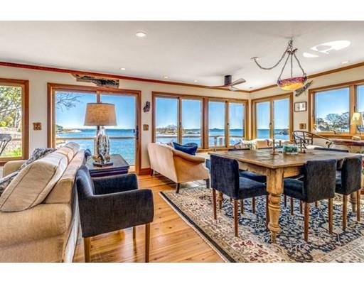 2 Gas House Lane Marblehead, MA 01945 - Photo 8 of 25 a living room with a table chairs and a dining table