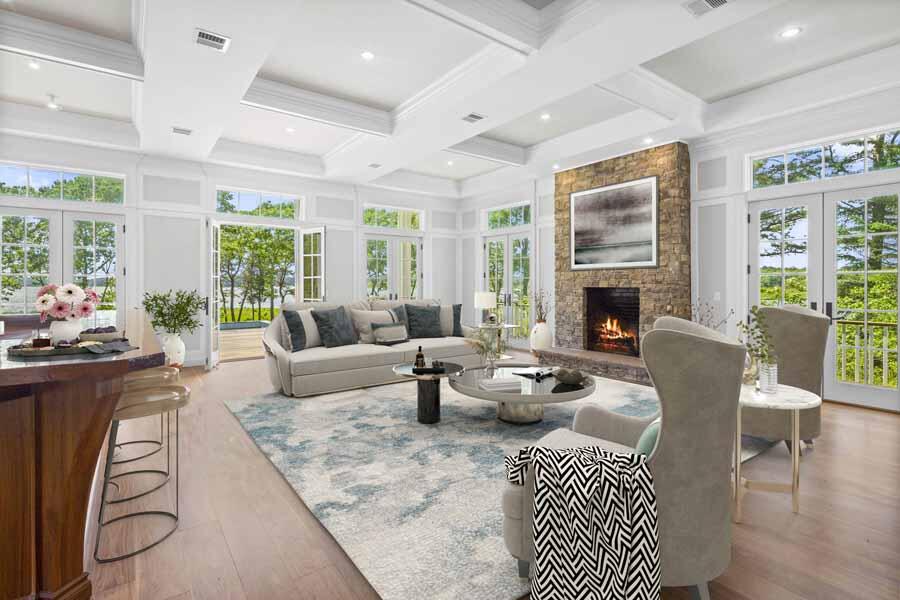 160 Peppercorn Lane Cotuit, MA 02635 - Photo 20 of 43 a living room with furniture fireplace and a large window